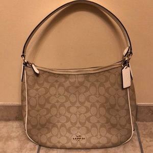 Medium sized Coach purse.